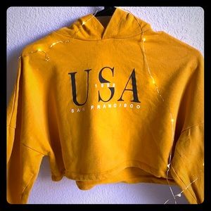 It’s a Forever 21 cropped hoodie.